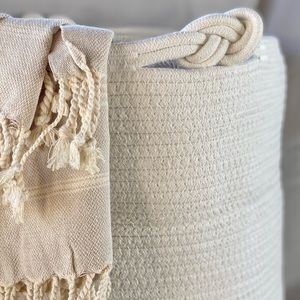 Decorative enough to display on its own, it’s an attractive rope basket.